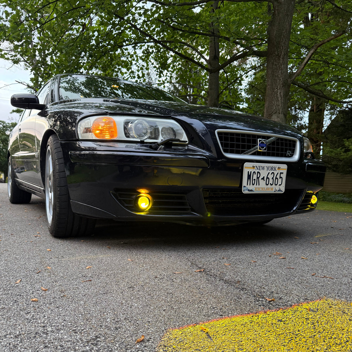 Low-angle view of Volvo V70R with yellow LED fog lights